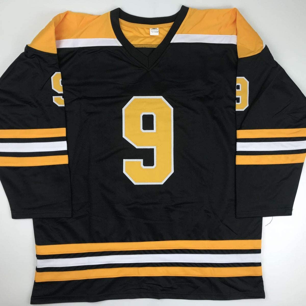 Autographed/Signed Johnny John Bucyk HOF 1981 Boston Black Hockey Jersey JSA COA