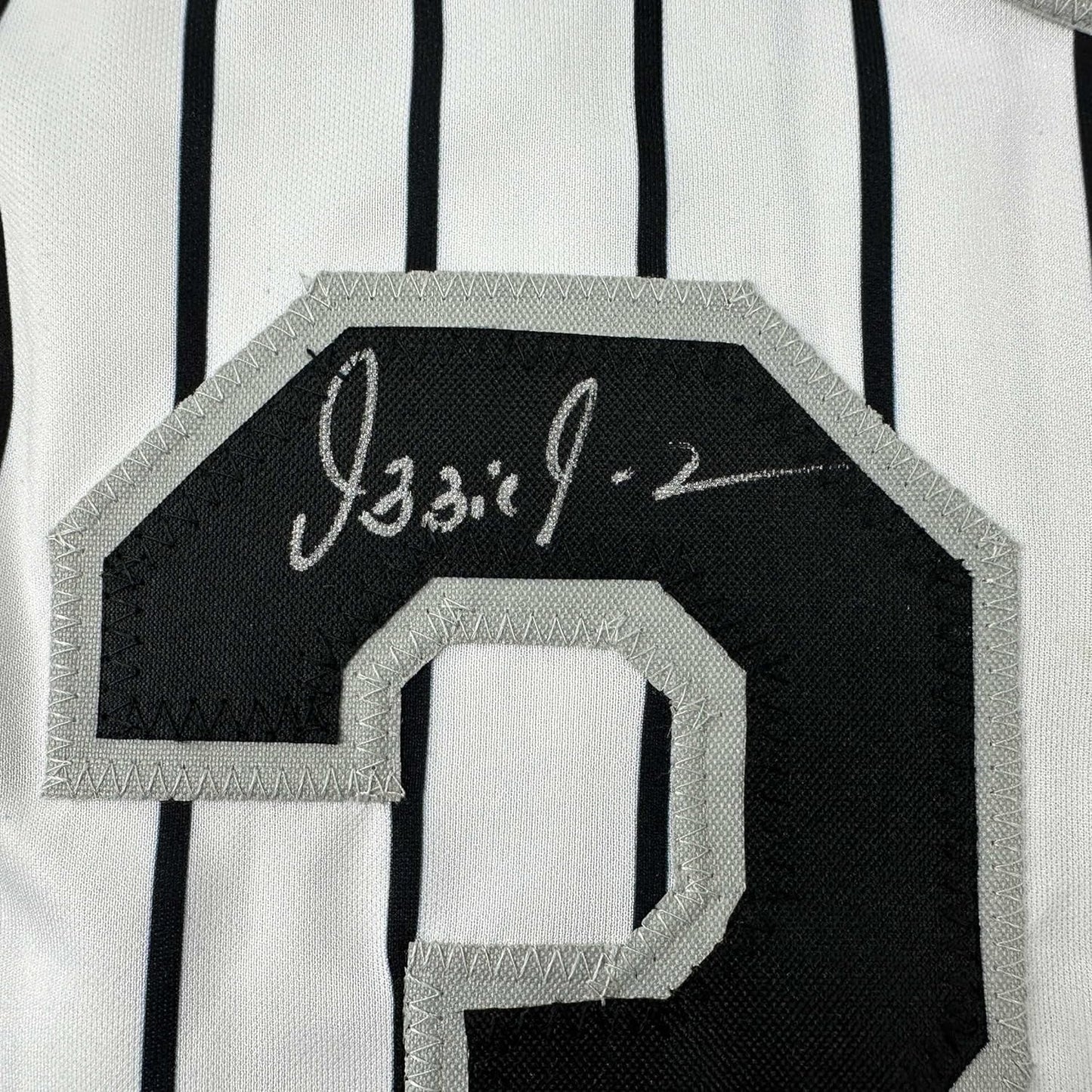 Framed Autographed/Signed Ozzie Guillen 35x39 Chicago Pinstripe Baseball Jersey JSA COA
