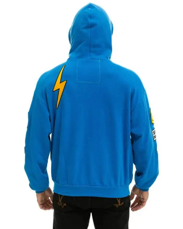And Just Like That Alexa Swinton Blue Patch Hoodie