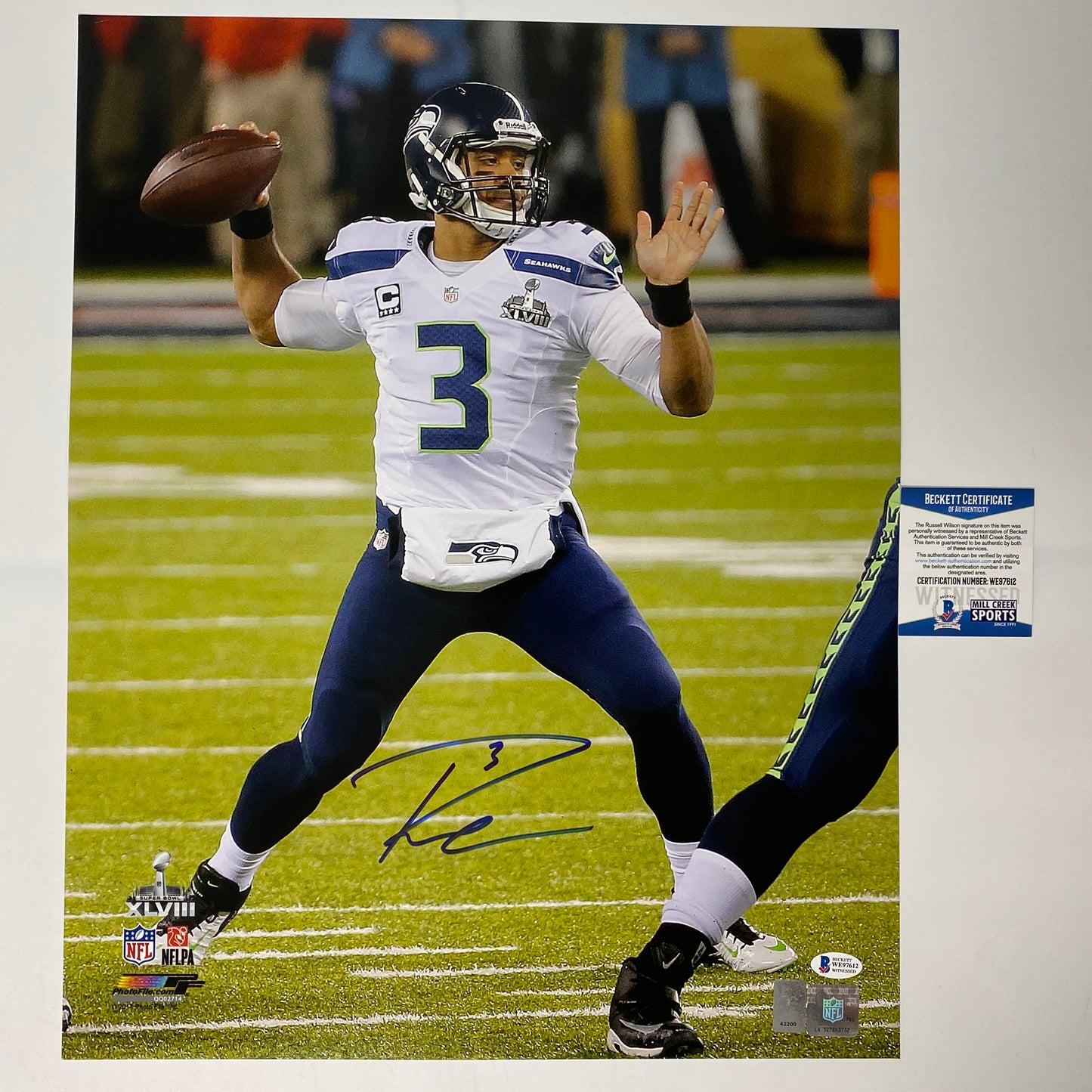 Autographed/Signed Russell Wilson Seattle Seahawks 16x20 Football Photo Beckett BAS COA