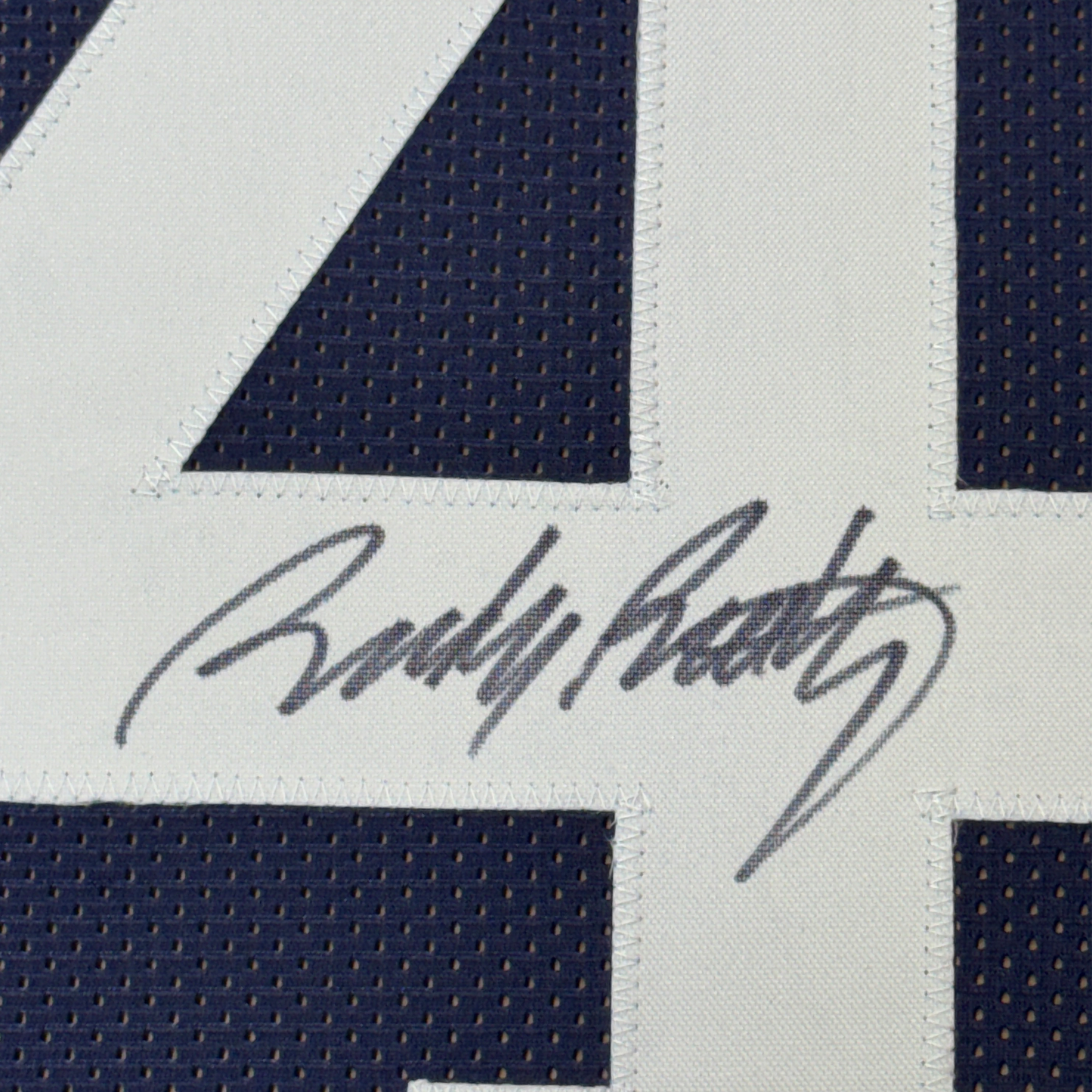 Framed Autographed/Signed Rudy Ruettiger 35x39 Never Quit Notre Dame Blue College Football Jersey JSA COA