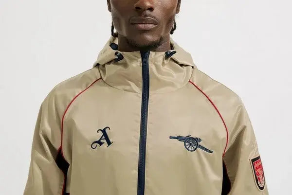 Veste coupe-vent rétro dorée d’Arsenal
