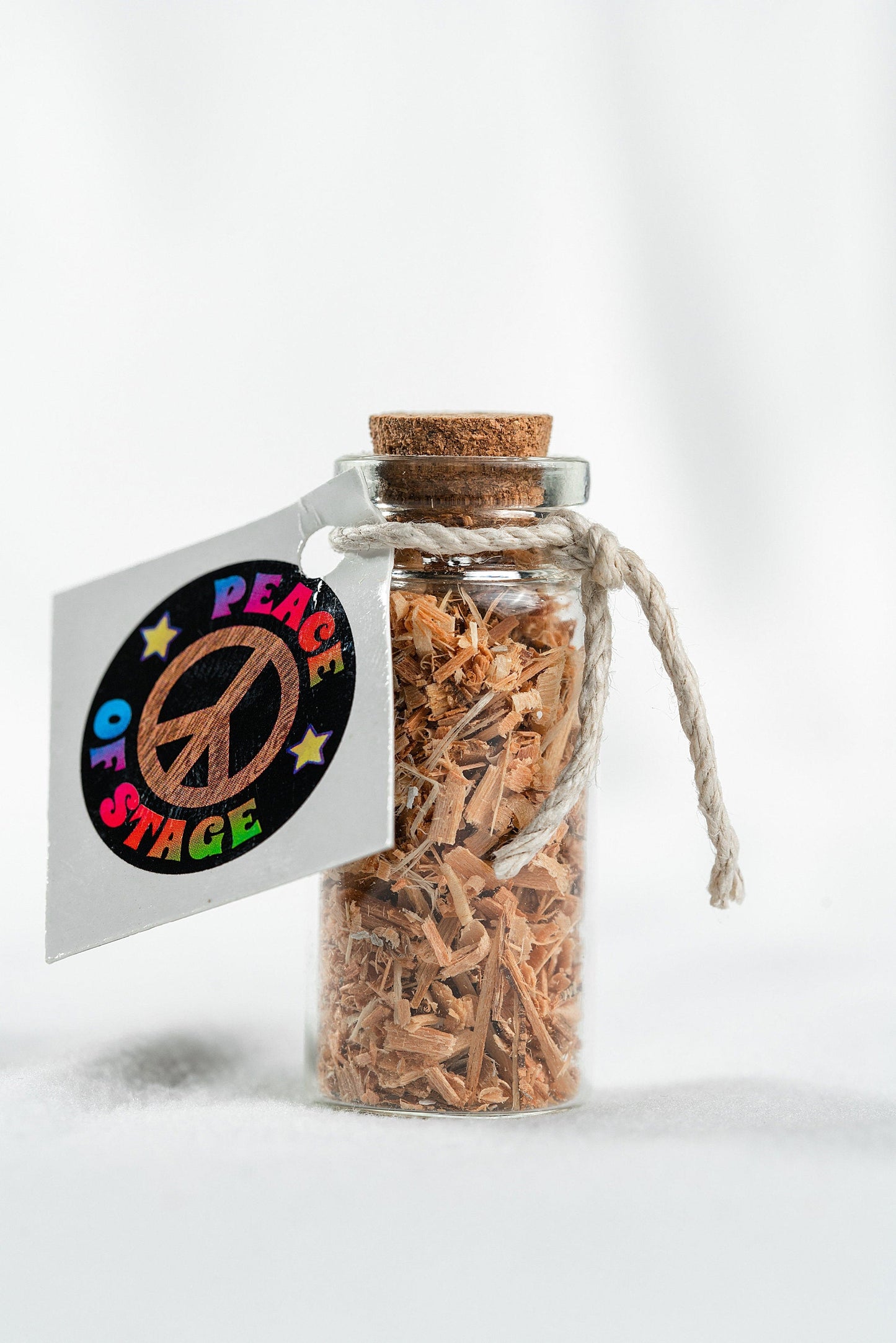 Glass Bottle Filled with Shavings and Sawdust from the Original 1969 Woodstock Stage Wood