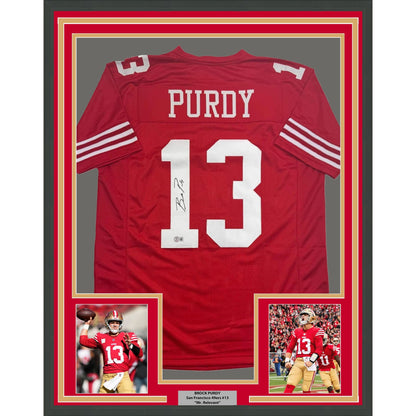 Framed Autographed/Signed Brock Purdy 35x39 San Francisco Red Football Jersey Beckett BAS COA