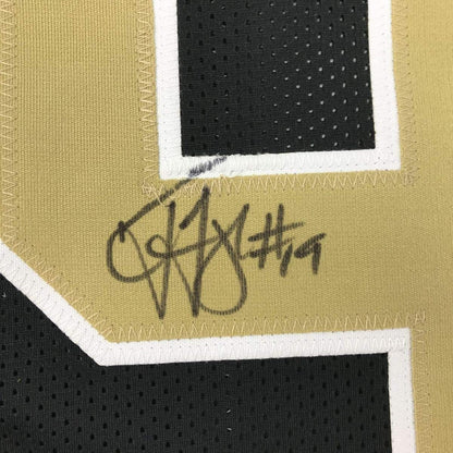 Framed Autographed/Signed Ted Ginn Jr. 35x39 New Orleans Black Football Jersey JSA COA