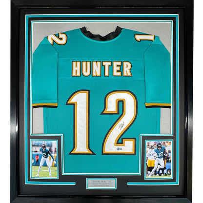 Framed Autographed/Signed Travis Hunter 35x39 Jacksonville Teal Retro Football Jersey Beckett BAS COA