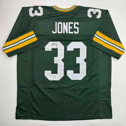 Autographed/Signed Aaron Jones Green Bay Green Football Jersey Beckett BAS COA