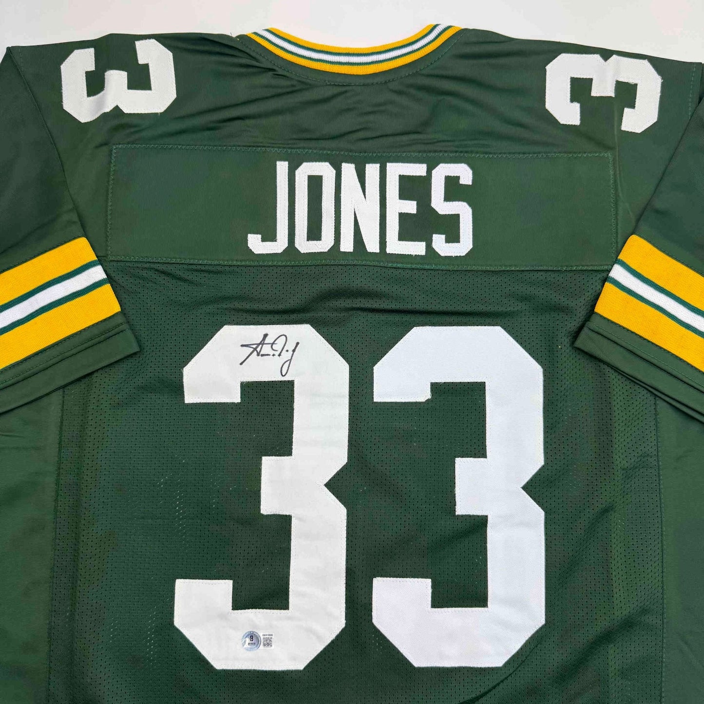 Autographed/Signed Aaron Jones Green Bay Green Football Jersey Beckett BAS COA