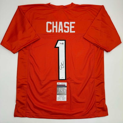 Autographed/Signed Ja'Marr Chase Cincinnati Orange Football Jersey JSA COA