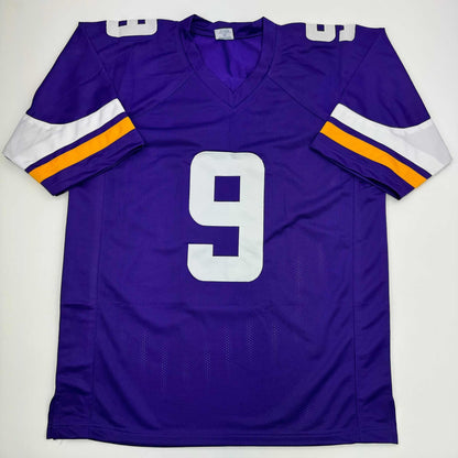 Autographed/Signed J.J. JJ McCarthy Minnesota Purple Football Jersey Beckett BAS COA