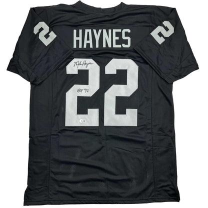 Autographed/Signed Michael Mike Haynes HOF 97 Oakland Black Football Jersey Beckett BAS COA