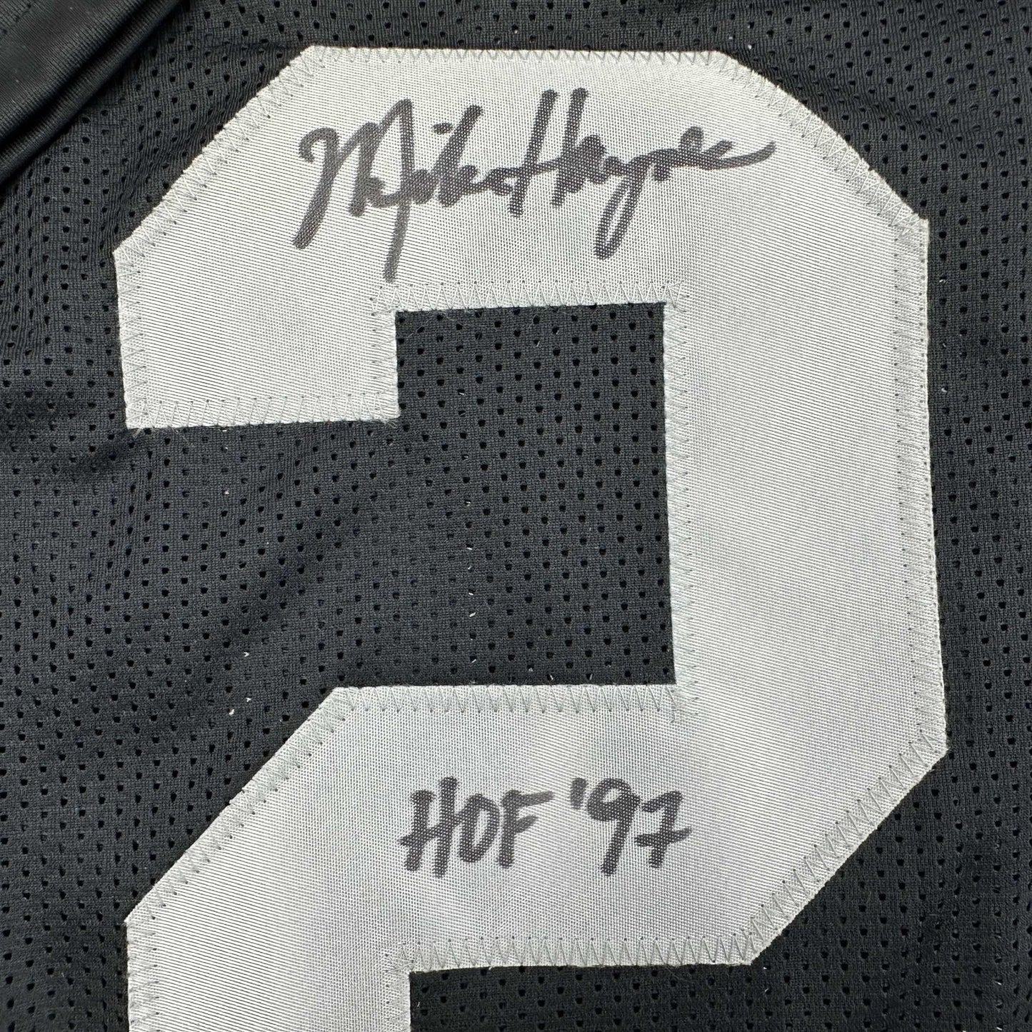 Autographed/Signed Michael Mike Haynes HOF 97 Oakland Black Football Jersey Beckett BAS COA