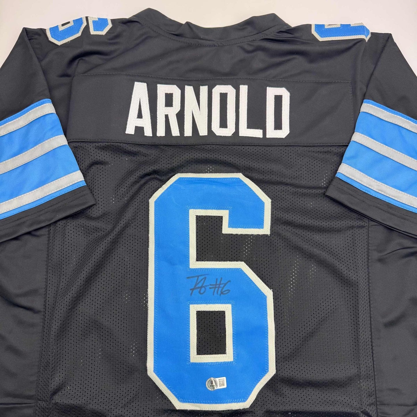 Autographed/Signed Terrion Arnold Detroit Black Football Jersey Beckett BAS COA