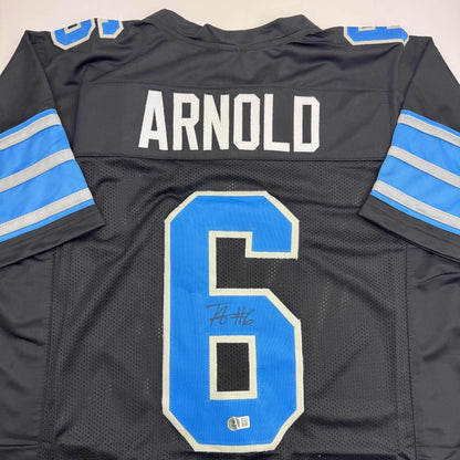 Autographed/Signed Terrion Arnold Detroit Black Football Jersey Beckett BAS COA
