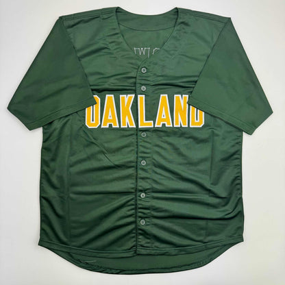 Autographed/Signed Mark McGwire Oakland Green Baseball Jersey Beckett BAS COA