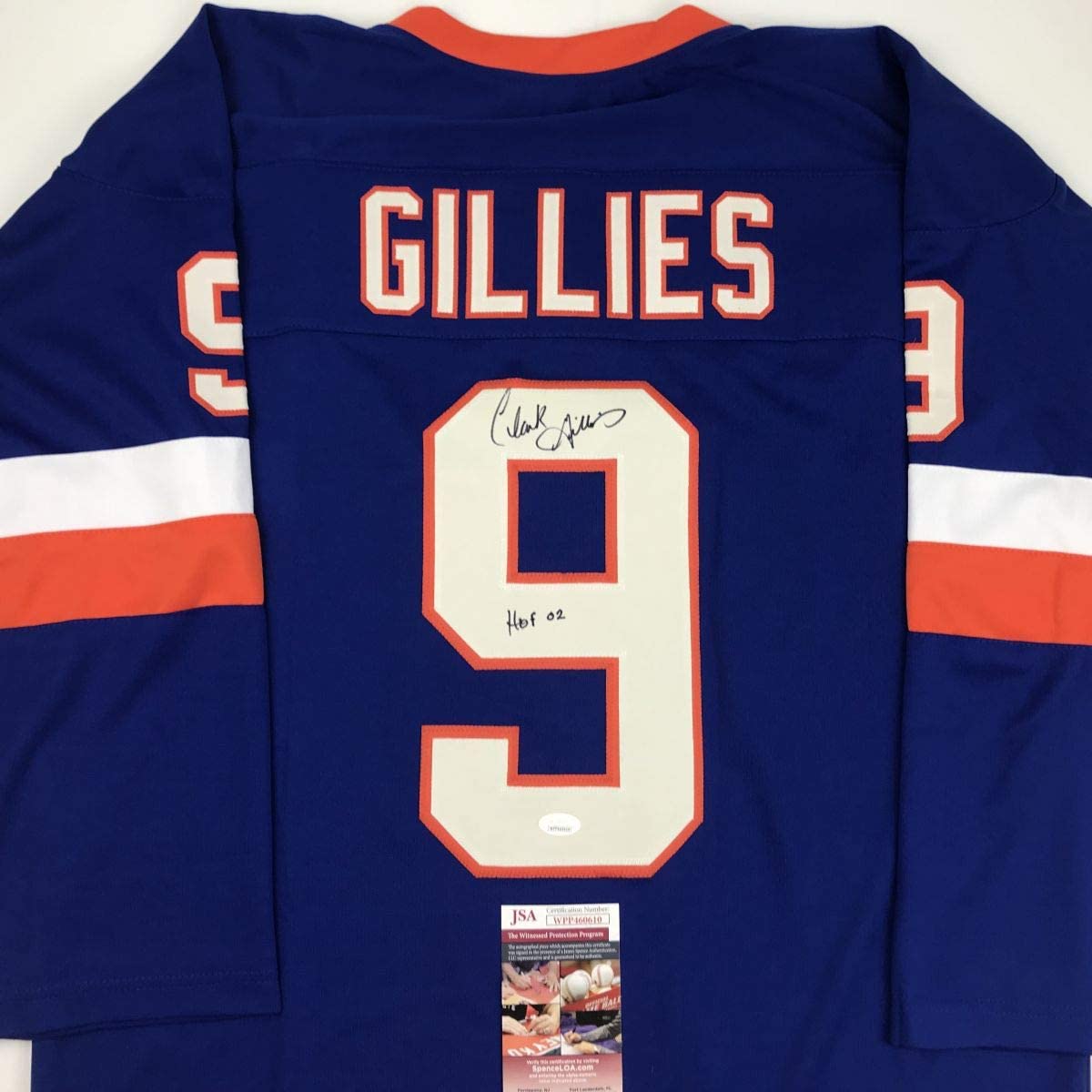 Autographed/Signed Clark Gillies HOF 02 New York Blue Hockey Jersey JSA COA