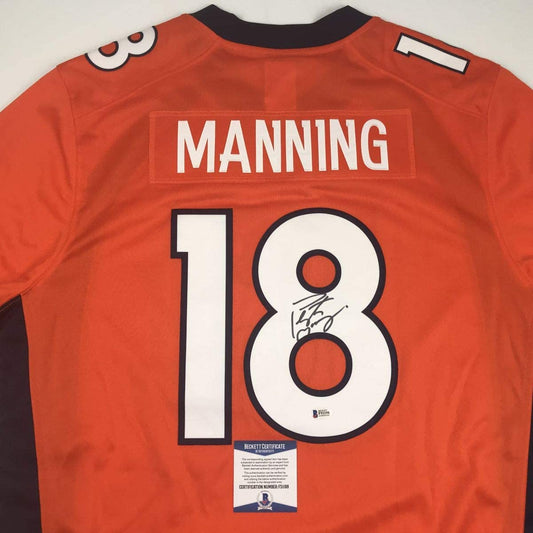 Autographed/Signed Peyton Manning Denver Orange Football Jersey Beckett BAS COA