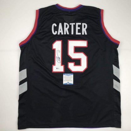 Autographed/Signed Vince Carter Toronto Black Basketball Jersey Beckett BAS COA
