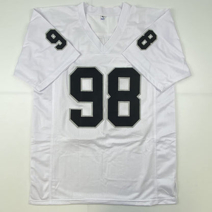 Autographed/Signed Maxx Crosby Las Vegas Oakland White Football Jersey Beckett BAS COA