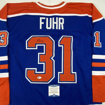Autographed/Signed Grant Fuhr Edmonton Blue Hockey Jersey Beckett BAS COA
