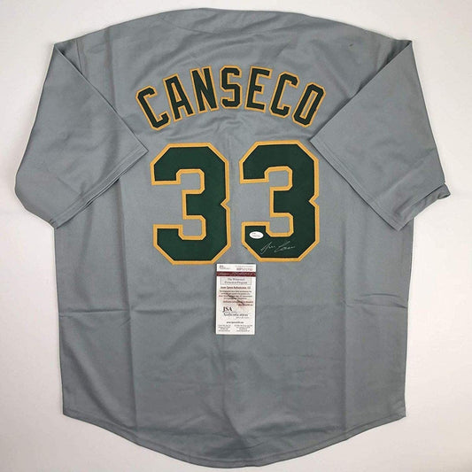 Autographed/Signed Jose Canseco Oakland Grey Baseball Jersey JSA COA
