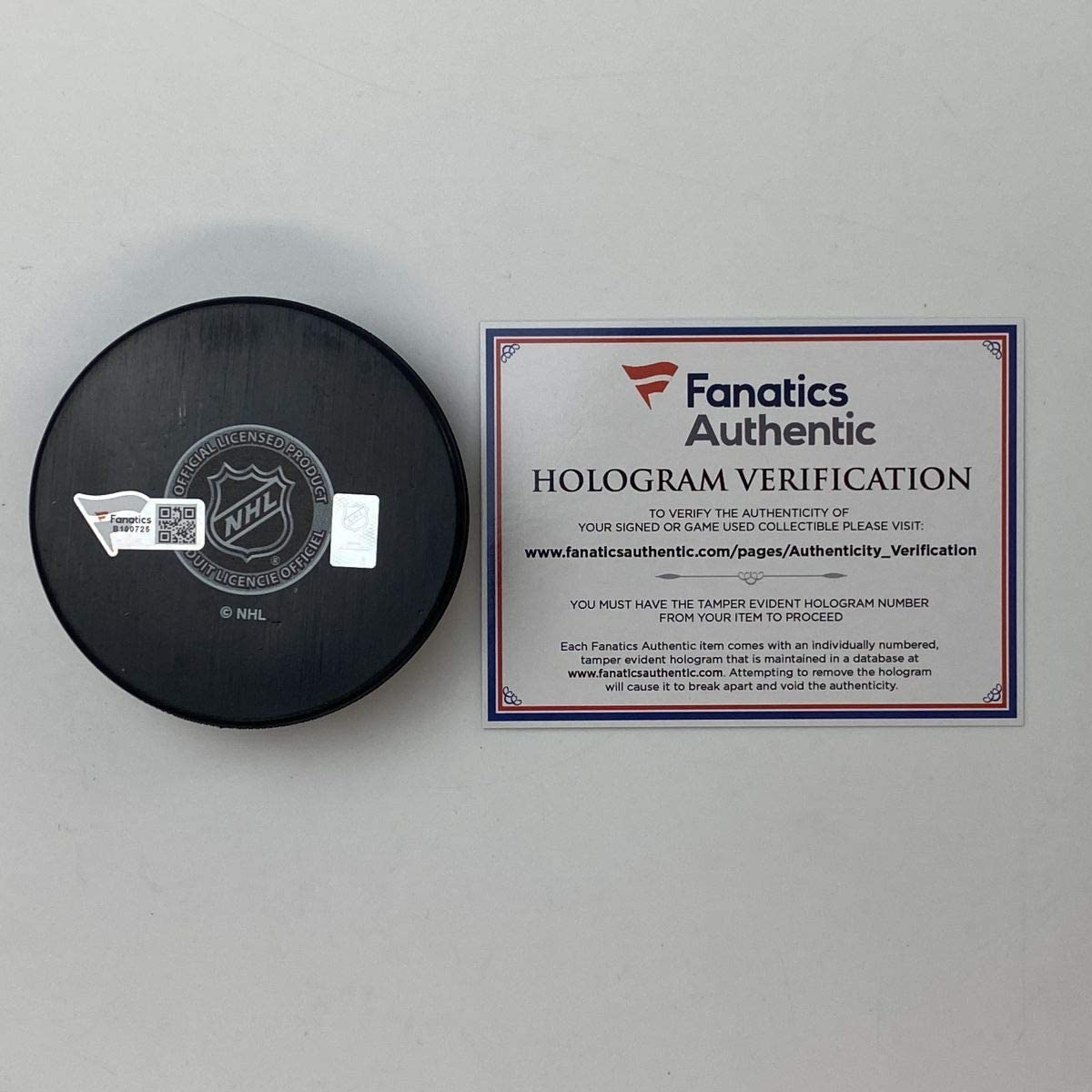 Autographed/Signed Nathan MacKinnon Colorado Avalanches Logo Hockey Puck Fanatics COA