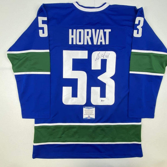 Autographed/Signed Bo Horvat Vancouver Blue Hockey Jersey Beckett BAS COA