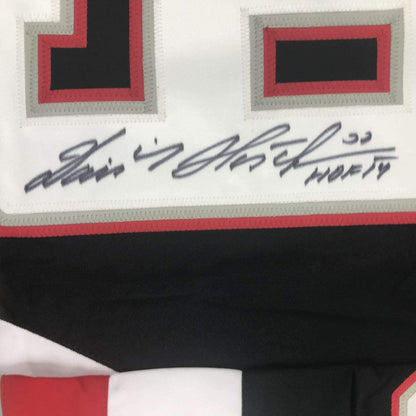 Autographed/Signed Dominik Hasek HOF 14 Buffalo Black Hockey Jersey JSA COA