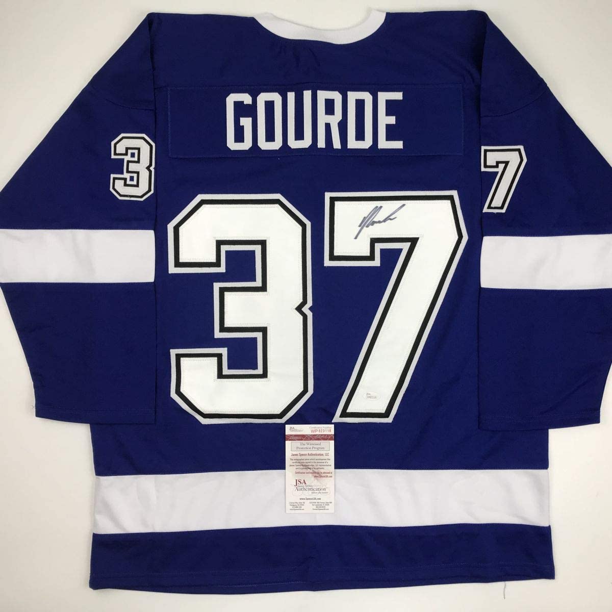 Autographed/Signed Yanni Gourde Tampa Bay Blue Hockey Jersey JSA COA