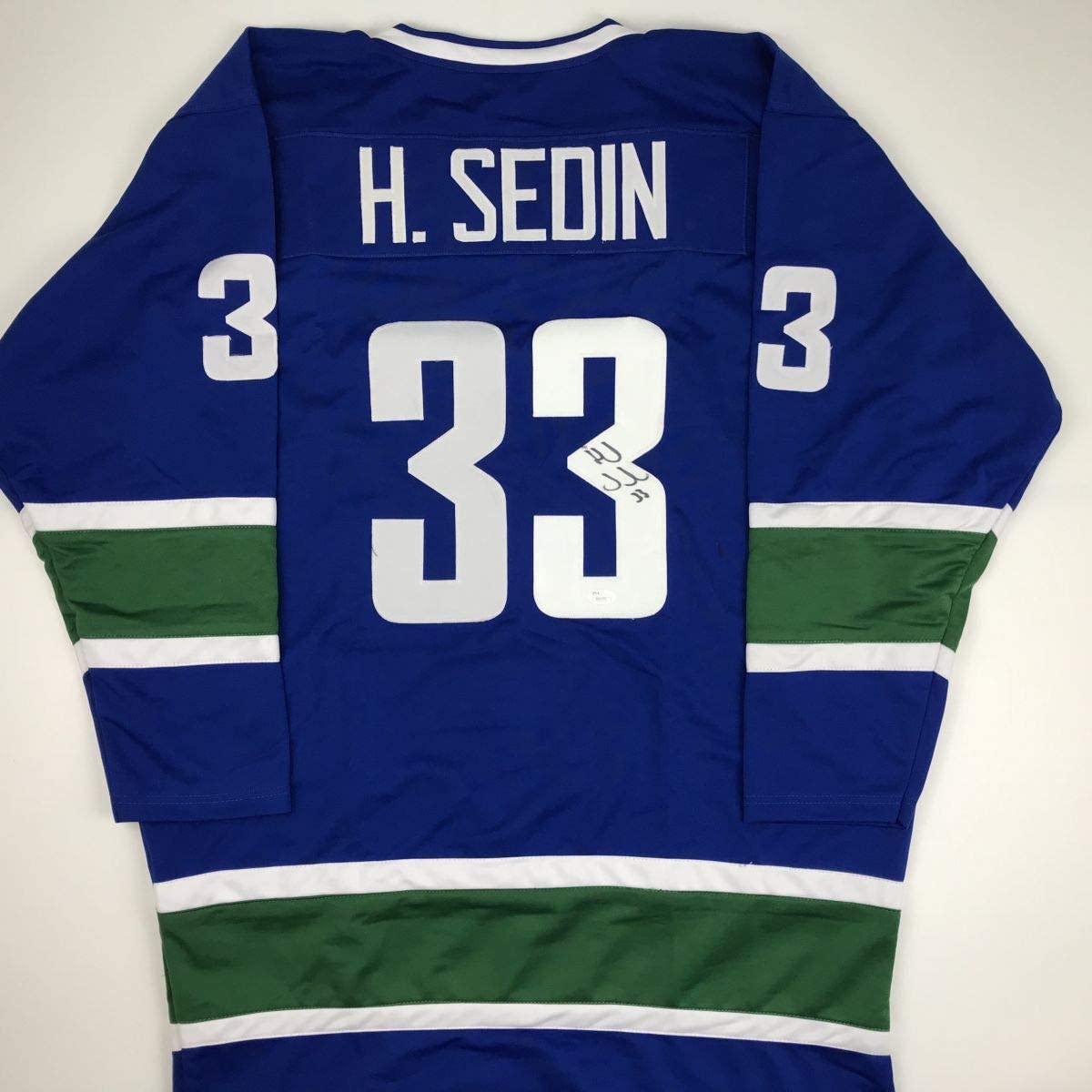 Autographed/Signed Henrik Sedin Vancouver Blue Hockey Jersey JSA COA Holo Only