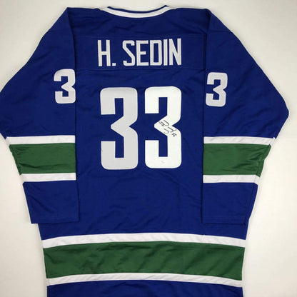 Autographed/Signed Henrik Sedin Vancouver Blue Hockey Jersey JSA COA Holo Only