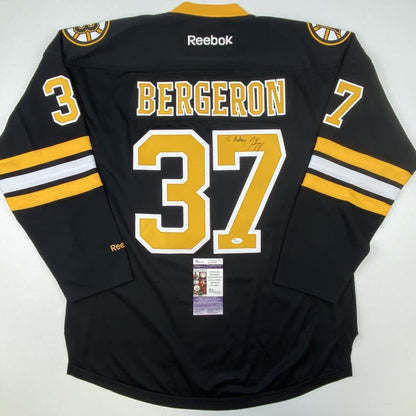 Autographed/Signed Patrice Bergeron Personalized To Anthony Boston Bruins Black Hockey Jersey JSA COA
