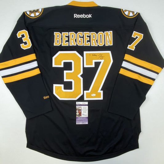 Autographed/Signed Patrice Bergeron Personalized To Anthony Boston Bruins Black Hockey Jersey JSA COA