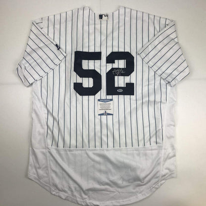 Autographed/Signed CC C.C. Sabathia New York Pinstripe Baseball Jersey Beckett BAS COA