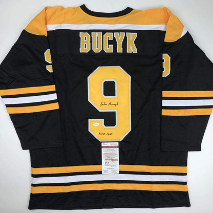 Autographed/Signed Johnny John Bucyk HOF 1981 Boston Black Hockey Jersey JSA COA