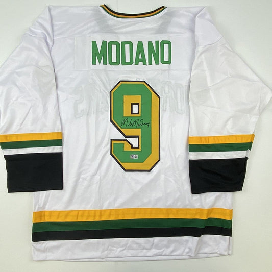 Autographed/Signed Mike Modano Minnesota White Hockey Jersey Beckett BAS COA