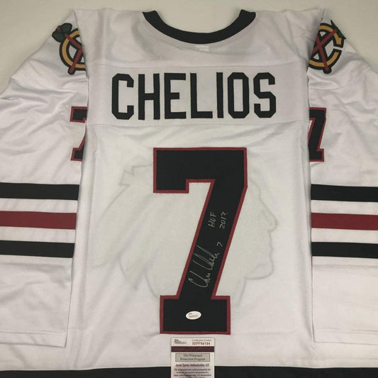 Autographed/Signed Chris Chelios HOF 2013 Chicago White Hockey Jersey JSA COA