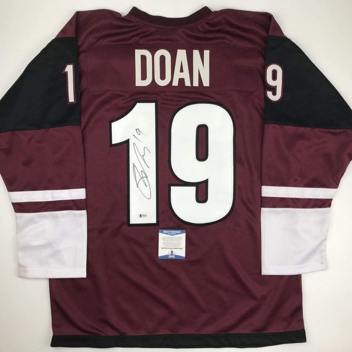 Autographed/Signed Shane Doan Arizona Maroon Hockey Jersey Beckett BAS COA