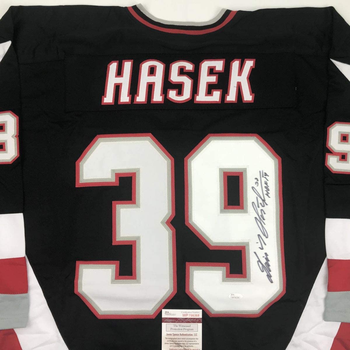 Autographed/Signed Dominik Hasek HOF 14 Buffalo Black Hockey Jersey JSA COA