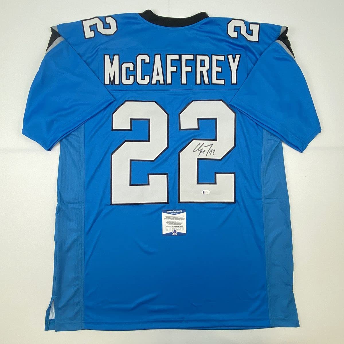 Autographed/Signed Christian McCaffrey Carolina Blue Football Jersey Beckett BAS COA