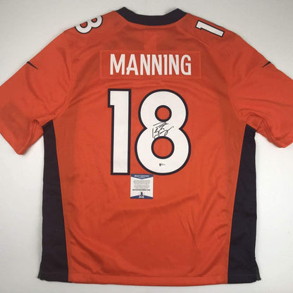 Autographed/Signed Peyton Manning Denver Orange Football Jersey Beckett BAS COA