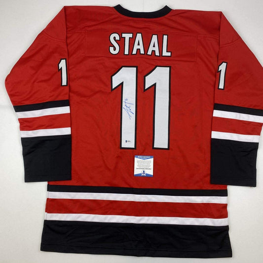 Autographed/Signed Jordan Staal Carolina Red Hockey Jersey Beckett BAS COA