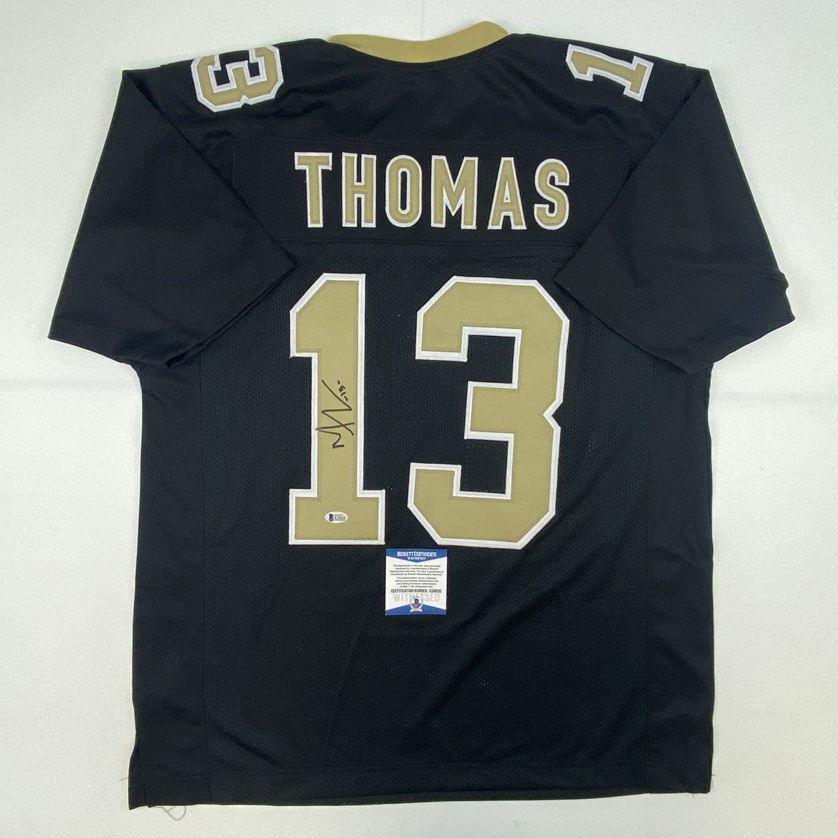 Autographed/Signed Michael Thomas New Orleans Black Football Jersey Beckett BAS COA