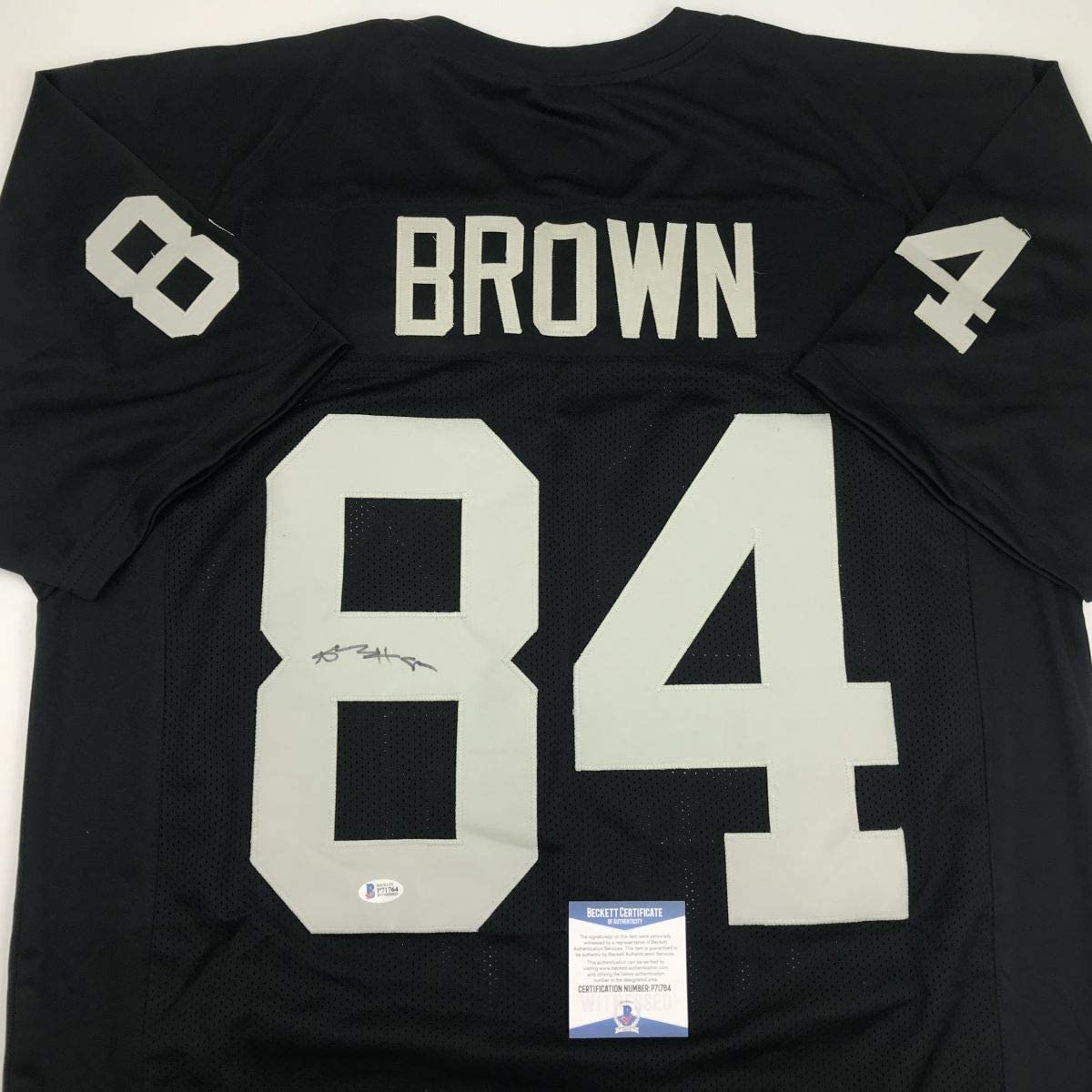 Autographed/Signed Antonio Brown Oakland Black Football Jersey Beckett BAS COA