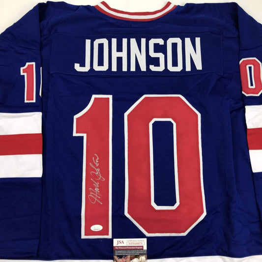 Autographed/Signed Mark Johnson Blue Team USA Miracle On Ice 1980 Olympics Hockey Jersey JSA COA