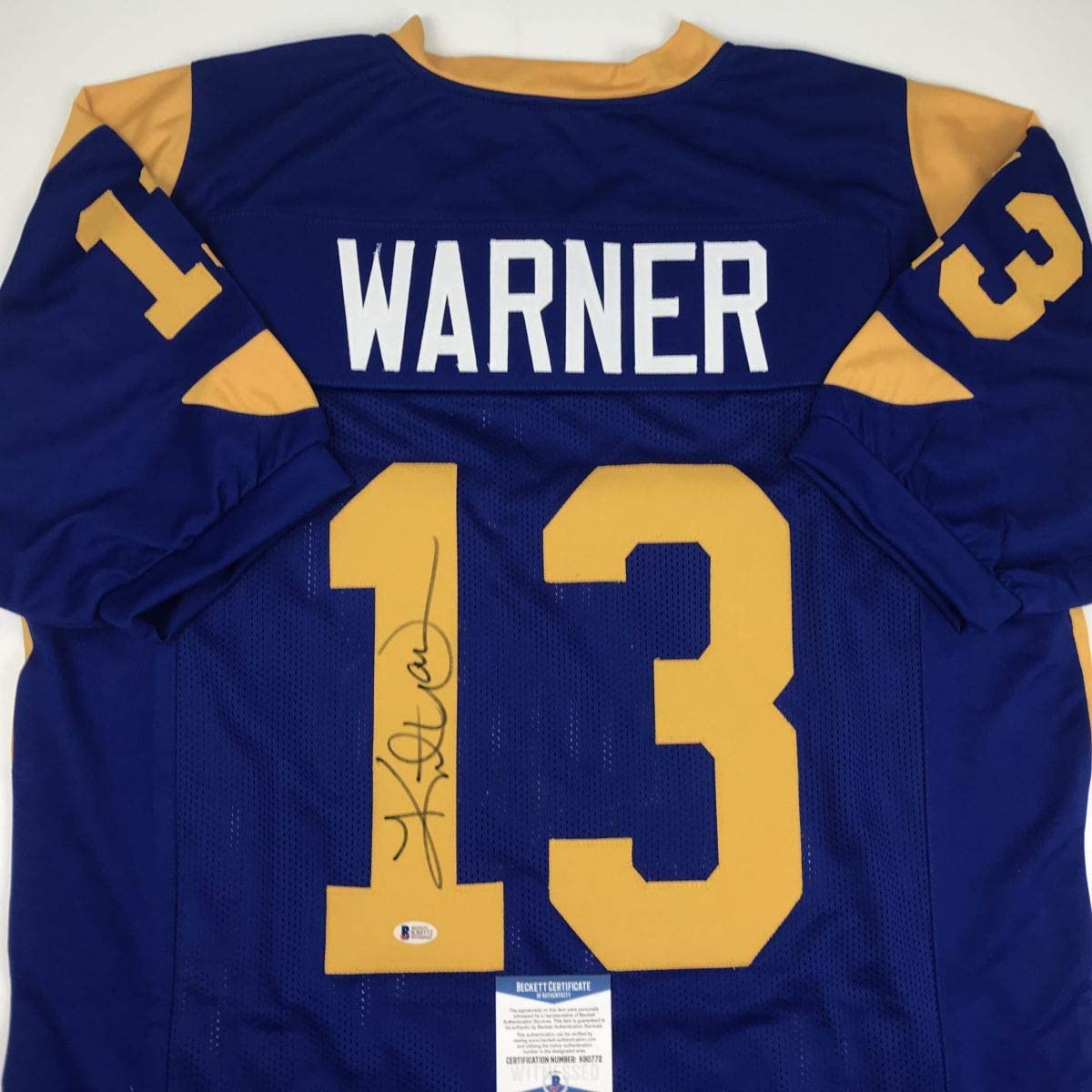 Autographed/Signed Kurt Warner St. Louis Blue Football Jersey JSA COA