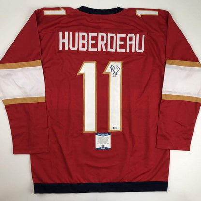 Autographed/Signed Jonathan Huberdeau Florida Red Hockey Jersey Beckett BAS COA