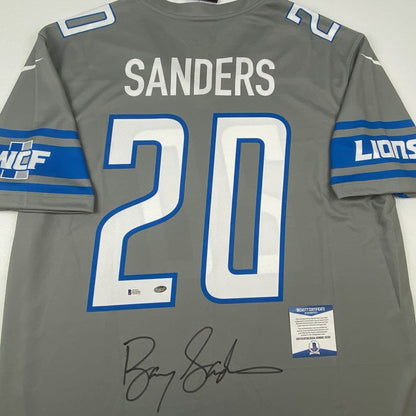 Autographed/Signed Barry Sanders Detroit Lions Grey Football Jersey Beckett BAS COA