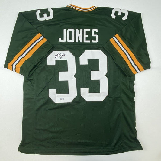 Autographed/Signed Aaron Jones Green Bay Green Football Jersey Beckett BAS COA