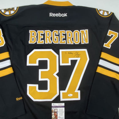 Autographed/Signed Patrice Bergeron Personalized To Anthony Boston Bruins Black Hockey Jersey JSA COA